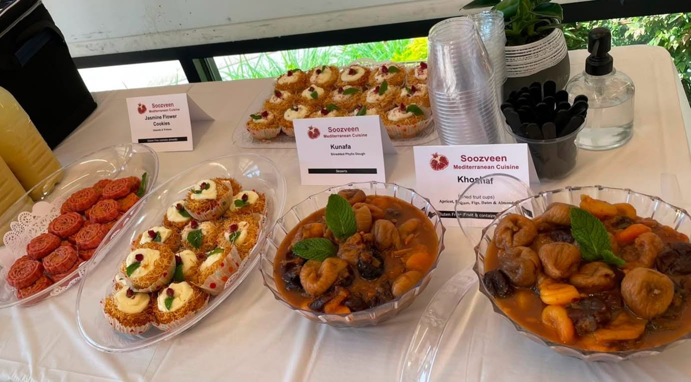 SoozVeen catering dessert table with kunafa, jasmine flower cookies and khoshaf